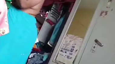 Grandmother wearing blouse and showing naked boobs