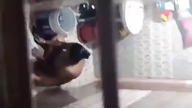 Neighbor aunty taking bath caught by voyeur