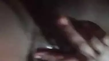 Village girl applying lotion to full nude body