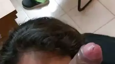 Secretary sucks her boss’s balls during office sex