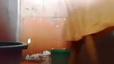 Bangladeshi Maid taking shower.